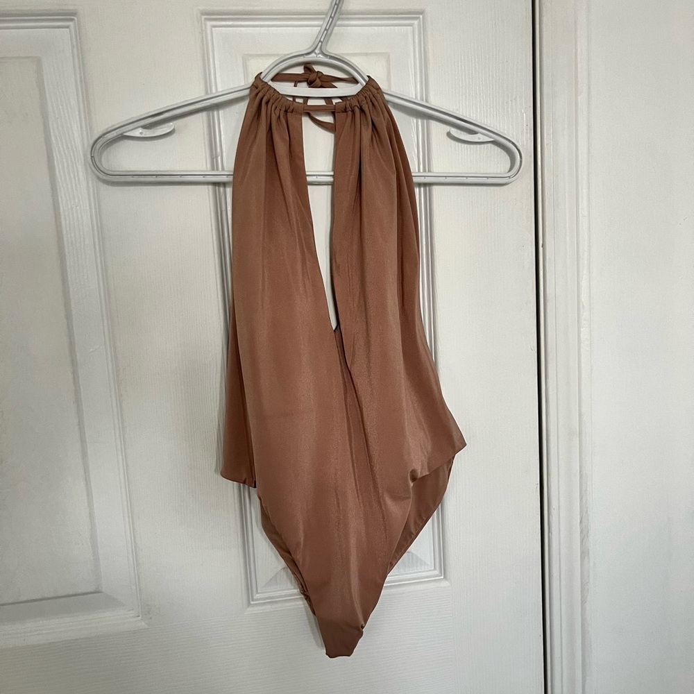 Beautiful open back nude bodysuit